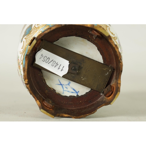 37 - AN 18TH CENTURY ORMOLU MOUNTED SERVES JAR AND COVER with shaped cut-out leafwork plinth and fruit fi... 