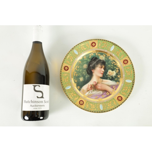 38 - A LATE 19TH CENTURY VIENNA PORCELAIN CABINET PLATE the richly jewelled gilded panelled green ground ... 