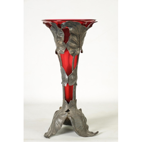 4 - A STYLISH ART NOUVEAU PEWTER AND CRANBERRY GLASS ORCHID VASE the lift-out trumpet-shaped glass body ... 