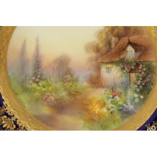 42 - A ROYAL WORCESTER CABINET PLATE PAINTED BY R RUSHTON the scalloped richly gilt Royal Blue border wit... 