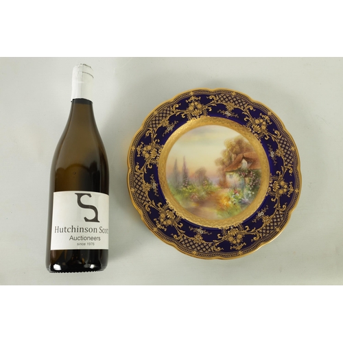 42 - A ROYAL WORCESTER CABINET PLATE PAINTED BY R RUSHTON the scalloped richly gilt Royal Blue border wit... 