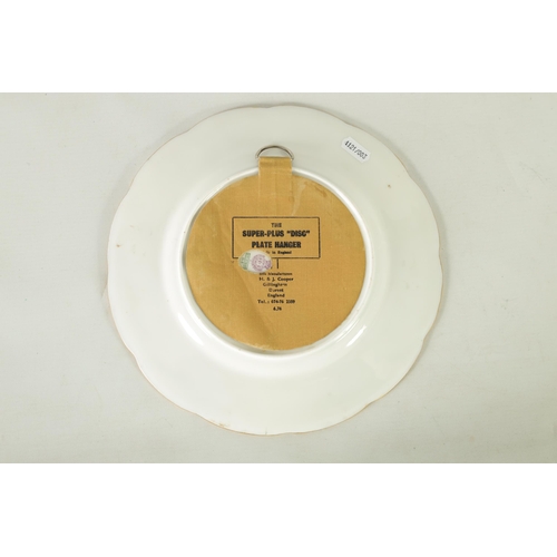 42 - A ROYAL WORCESTER CABINET PLATE PAINTED BY R RUSHTON the scalloped richly gilt Royal Blue border wit... 