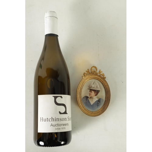 45 - A SMALL KPM BERLIN PORCELAIN PLAQUE. A late 19th century portrait of a young woman in blue dress and... 