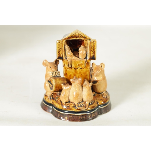 47 - A DOULTON LAMBETH TWO-TONE SHADED BROWN SALT GLAZED 'PLAY GOERS' GROUP OF MICE BY GEORGE TINWORTH CI... 