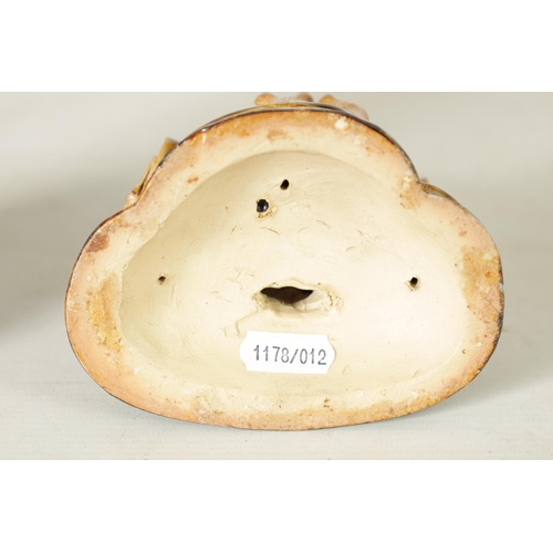 47 - A DOULTON LAMBETH TWO-TONE SHADED BROWN SALT GLAZED 'PLAY GOERS' GROUP OF MICE BY GEORGE TINWORTH CI... 