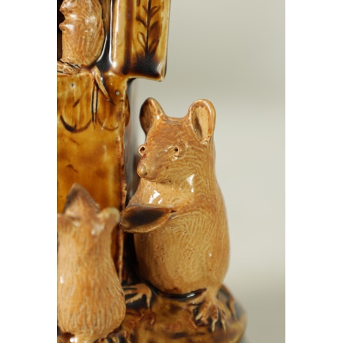 47 - A DOULTON LAMBETH TWO-TONE SHADED BROWN SALT GLAZED 'PLAY GOERS' GROUP OF MICE BY GEORGE TINWORTH CI... 