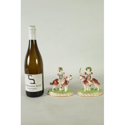 48 - A RARE PAIR OF EARLY 19TH CENTURY MINTON WAR AND PEACE FIGURINES finely modelled as children riding ... 
