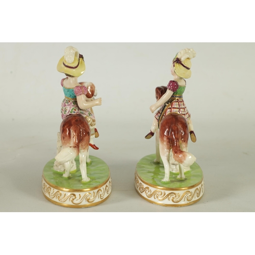 48 - A RARE PAIR OF EARLY 19TH CENTURY MINTON WAR AND PEACE FIGURINES finely modelled as children riding ... 