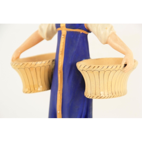 54 - A RUSSIAN PORCELAIN FIGURE depicting a young female carrying baskets mounted on a circular base. (23... 