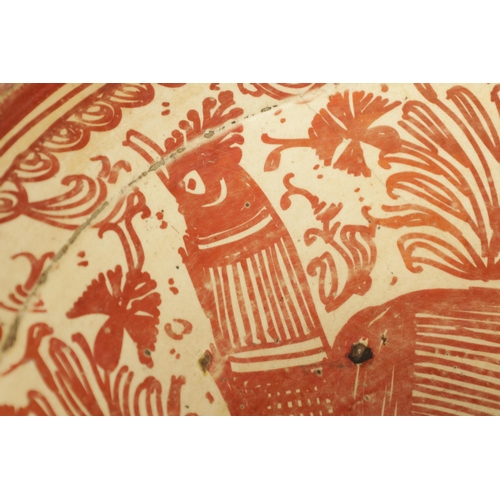 55 - A 17TH CENTURY COPPER LUSTRE HISPANO MORESQUE HANGING CHARGER decorated with central cockerel and sc... 