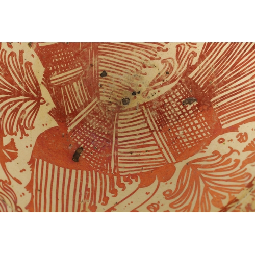 55 - A 17TH CENTURY COPPER LUSTRE HISPANO MORESQUE HANGING CHARGER decorated with central cockerel and sc... 