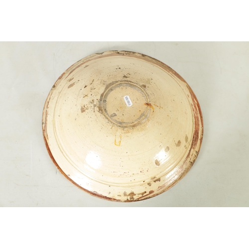 55 - A 17TH CENTURY COPPER LUSTRE HISPANO MORESQUE HANGING CHARGER decorated with central cockerel and sc... 