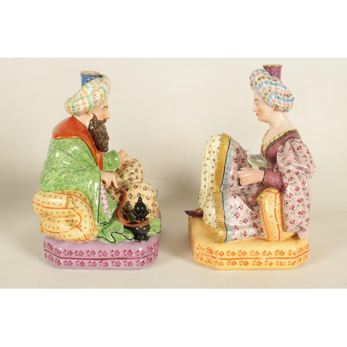 57 - A PAIR OF 19TH CENTURY FRENCH FIGURAL PORCELAIN PERFUME BOTTLES BY JACOB PETIT colourfully painted a... 
