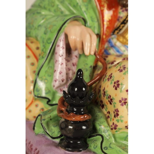 57 - A PAIR OF 19TH CENTURY FRENCH FIGURAL PORCELAIN PERFUME BOTTLES BY JACOB PETIT colourfully painted a... 