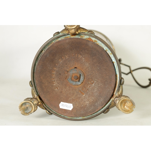 62 - A 19TH-CENTURY DOULTON STONEWARE AND GILT BRASS MOUNTED OIL LAMP DECORATED BY FLORENCE BARLOW the le... 