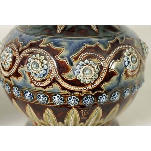 92 - A GOOD PAIR OF DOULTON LAMBETH FOOTED BULBOUS FLARED NECK VASES BEARING MONOGRAM FOR GEORGE TINWORTH... 