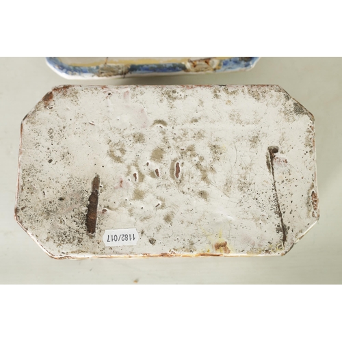 99 - A 17TH/18TH CENTURY POLYCHROME CONTINENTAL MAJOLICA CASKET AND COVER of canted rectangular form with... 