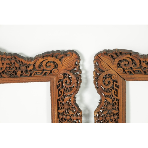 304 - A PAIR OF LATE 19TH CENTURY CHINESE CARVED AND PIERCED SANDALWOOD PICTURE FRAMES