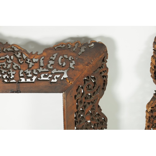 304 - A PAIR OF LATE 19TH CENTURY CHINESE CARVED AND PIERCED SANDALWOOD PICTURE FRAMES