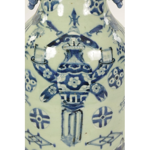 310 - A LARGE 19TH CENTURY CHINESE CELADON GLAZE PORCELAIN VASE of tapering form with flared neck, decorat... 