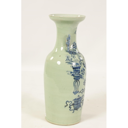 310 - A LARGE 19TH CENTURY CHINESE CELADON GLAZE PORCELAIN VASE of tapering form with flared neck, decorat... 