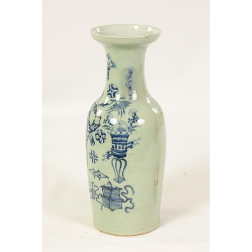 310 - A LARGE 19TH CENTURY CHINESE CELADON GLAZE PORCELAIN VASE of tapering form with flared neck, decorat... 