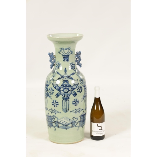 310 - A LARGE 19TH CENTURY CHINESE CELADON GLAZE PORCELAIN VASE of tapering form with flared neck, decorat... 