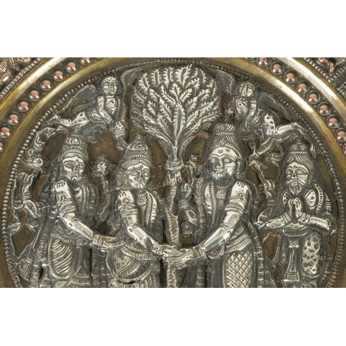 316 - A LATE 19TH CENTURY INDIAN BRONZE AND MIXED METAL PLAQUE with silver and copper metal figural relief... 
