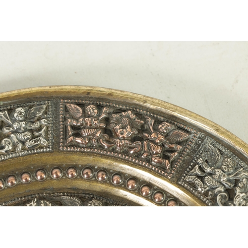 316 - A LATE 19TH CENTURY INDIAN BRONZE AND MIXED METAL PLAQUE with silver and copper metal figural relief... 
