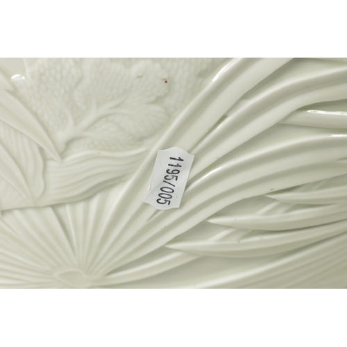 326 - A LARGE JAPANESE MEIJI PERIOD PALE CELADON GLAZE POTTERY VASE AND COVER with overall relief moulded ... 