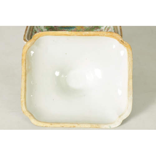 331 - A 19TH CENTURY CHINESE CANTON FAMILLE ROSE TUREEN AND COVER decorated figural and floral panels amon... 