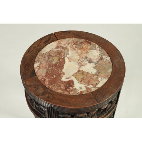 335 - A 19TH CENTURY CHINESE HARDWOOD CIRCULAR JARDINERE TABLE with inset marble top and geometric pierced... 