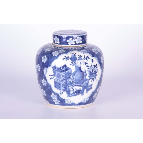 349 - AN 18TH/19TH CENTURY CHINESE BLUE AND WHITE GINGER JAR AND COVER painted with cloud-shaped panels co... 