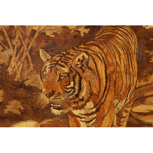 351 - AN EARLY 20TH CENTURY INDIAN MARQUETRY INLAID HARDWOOD PANEL the centre finely inlaid with a coloure... 