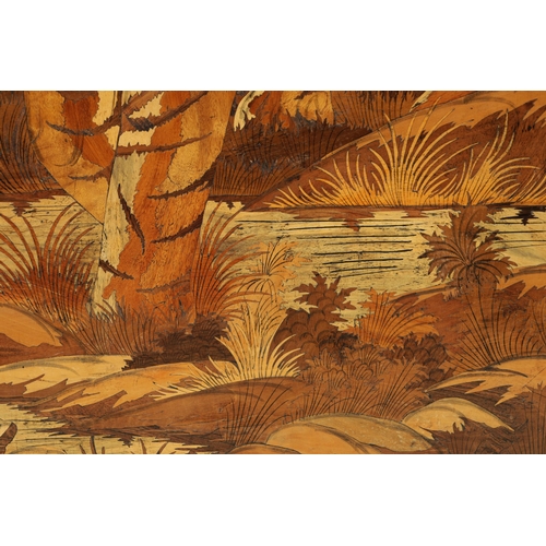 351 - AN EARLY 20TH CENTURY INDIAN MARQUETRY INLAID HARDWOOD PANEL the centre finely inlaid with a coloure... 