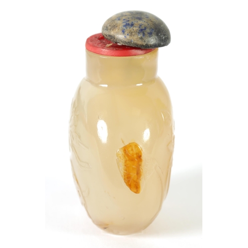 356 - A 19TH CENTURY CHINESE SMOKED GLASS SNUFF BOTTLE the shouldered flattened body carved with swimming ... 