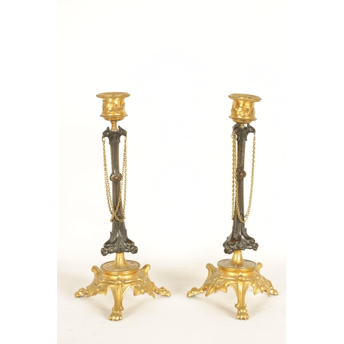 891 - A PAIR OF LATE 19TH CENTURY FRENCH BARBEDIENNE STYLE BRONZE AND ORMOLU CANDLESTICKS with naturalisti... 