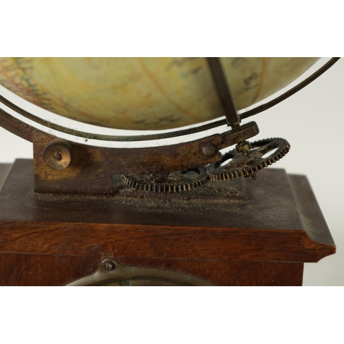 A GERMAN REVOLVING GLOBE CLOCK, CIRCA 1900 the 7