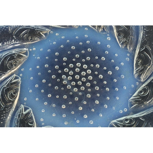 15 - A FRENCH RENE LALIQUE ‘POISSONS’ OPALESCENT GLASS COUPE PLATE of dished form with swirling sardines ... 