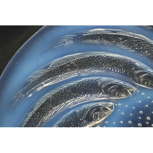 15 - A FRENCH RENE LALIQUE ‘POISSONS’ OPALESCENT GLASS COUPE PLATE of dished form with swirling sardines ... 