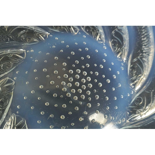 15 - A FRENCH RENE LALIQUE ‘POISSONS’ OPALESCENT GLASS COUPE PLATE of dished form with swirling sardines ... 
