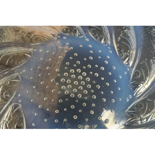 15 - A FRENCH RENE LALIQUE ‘POISSONS’ OPALESCENT GLASS COUPE PLATE of dished form with swirling sardines ... 