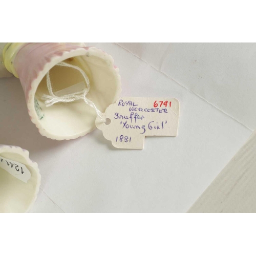 22 - OLD WOMAN AND YOUNG GIRL TWO ROYAL WORCESTER CANDLE EXTINGUISHERS Attributed to James Hadley, both w... 