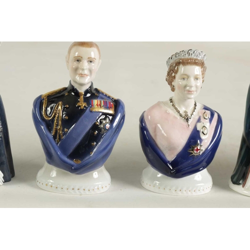 37 - A COLLECTION OF PORCELAIN FIGURAL CANDLE EXTINGUISHERS circa 1983 and 2002, comprising of a group of... 