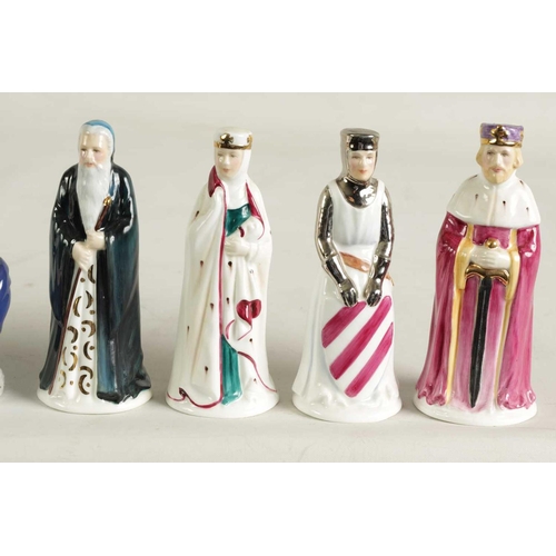 37 - A COLLECTION OF PORCELAIN FIGURAL CANDLE EXTINGUISHERS circa 1983 and 2002, comprising of a group of... 