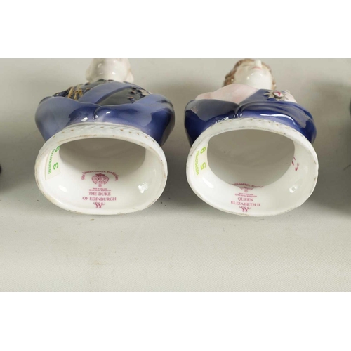 37 - A COLLECTION OF PORCELAIN FIGURAL CANDLE EXTINGUISHERS circa 1983 and 2002, comprising of a group of... 