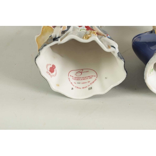 37 - A COLLECTION OF PORCELAIN FIGURAL CANDLE EXTINGUISHERS circa 1983 and 2002, comprising of a group of... 