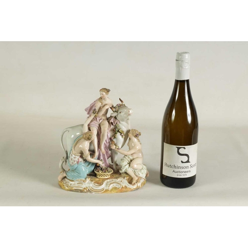 49 - A 19TH CENTURY MEISSEN FIGURE GROUP OF A BULL WITH A SEATED LADY RIDER AND A FLOWER SELLER finely mo... 