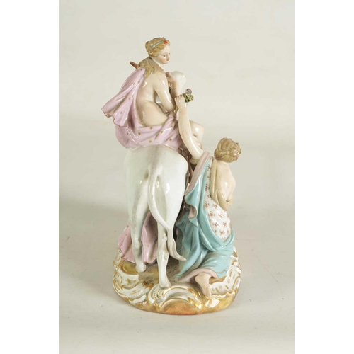 49 - A 19TH CENTURY MEISSEN FIGURE GROUP OF A BULL WITH A SEATED LADY RIDER AND A FLOWER SELLER finely mo... 