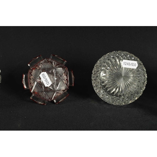 5 - A PAIR OF 19TH CENTURY CUT GLASS DECANTERS with bulls-eye stoppers, triple ringed necks and hobnail-... 